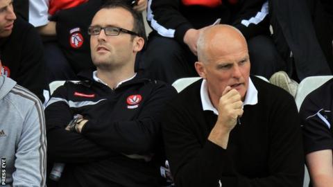 Former Antrim boss Liam Bradley pictured alongside his son Paddy