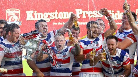 Rochdale celebrate winning the Kingstone Press Championship One grand final in 2013