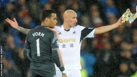 Swansea City Michel Vorm and midfielder Jonjo Shelvey