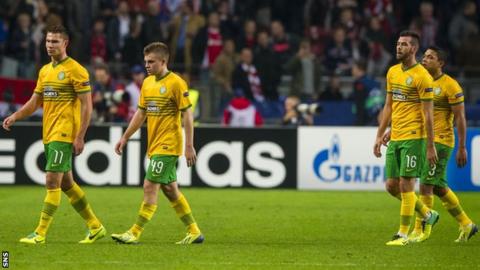 Celtic players look dejected following the 1-0 defeat by Ajax