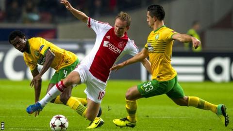 Efe Ambrose and Beram Kayal in action for Celtic against Ajax