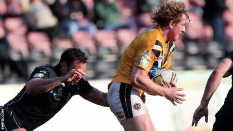 Castleford's Lee Mitchell carries the ball