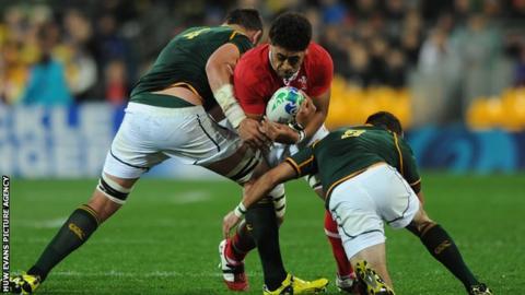Wales back-row Toby Faletau takes on the South Africa defence in 2011