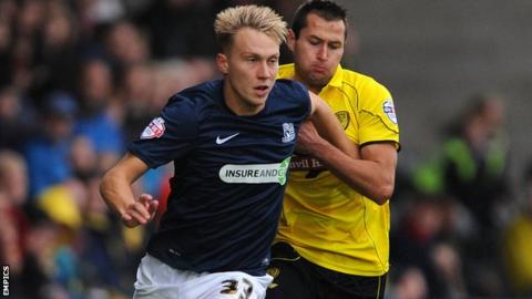 Cauley Woodrow in action against Burton Albion