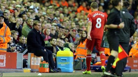 Liverpool captain Steven Gerrard walks off after being substituted by Reds boss Brendan Rodgers