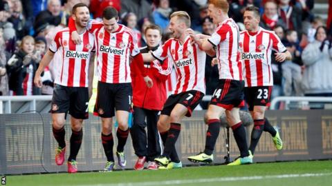 Phil Bardsley (far left) celebrates with teammates after putting Sunderland ahead against Man City