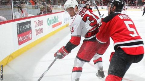 Joe Jensen (left) in action for the Carolina Hurricanes