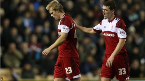 Middlesbrough's Curtis Main (left) is consoled by Richard Smallwood after being sent off at Derby