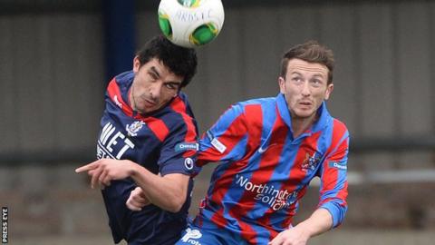 Emmett Friars beats Willie Faulkner of Ards to the high ball