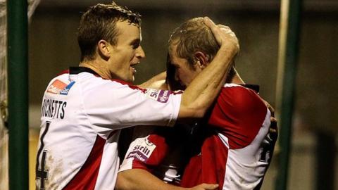 Scott Rendell celebrates scoring for Woking