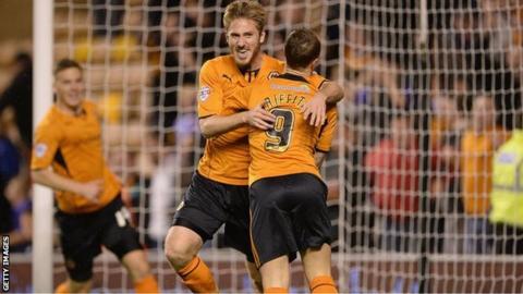 James Henry of Wolves celebrates scoring the first goal with team mate Leigh Griffiths