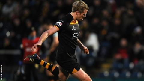 Joe Carlisle of London Wasps kicks a penalty during the Amlin Challenge Cup match between London Wasps and Grenoble