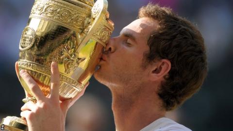 Andy Murray holds the Wimbledon trophy