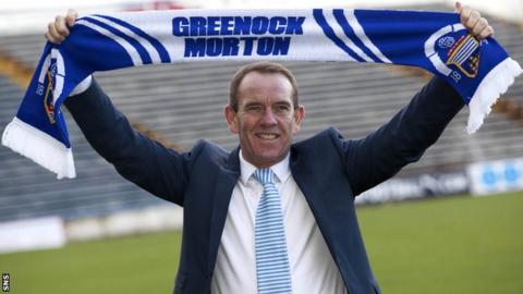 Kenny Shiels holds aloft a Greenock Morton scarf