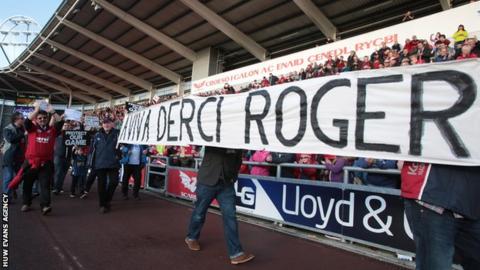 Regional rugby fans protest against the WRU before the Scarlets-Ospreys game on Boxing Day