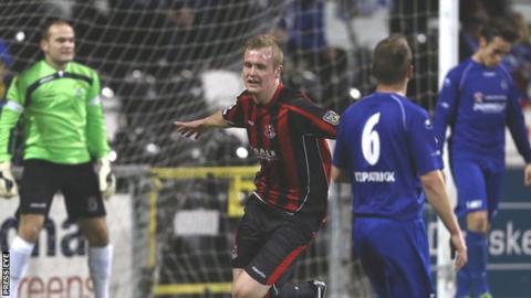 Jordan Owens celebrates scoring the opener against Dungannon