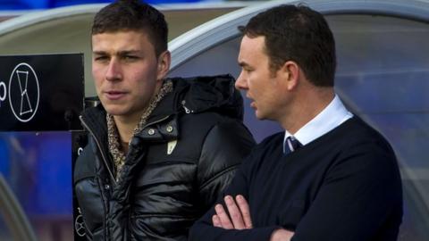 Filip Kiss and Ross County manager Derek Adams