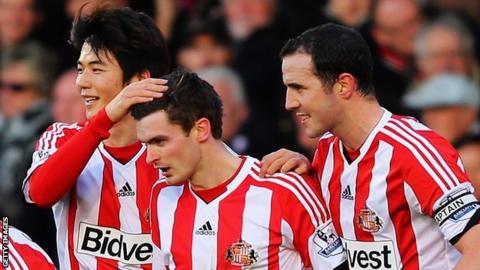 Adam Johnson mobbed Fulham v Sunderland