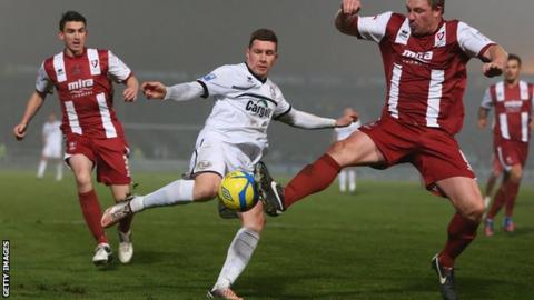 Phil Marsh (centre) in action for Hereford United