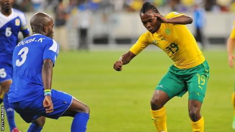 Kelly Youga (left) in action against South Africa in a World Cup qualifier in 2013