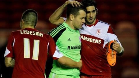 Middlesbrough's Shay Given (centre) celebrates with team-mates Emmanuel Ledesma (left) & Rhys Williams (right)