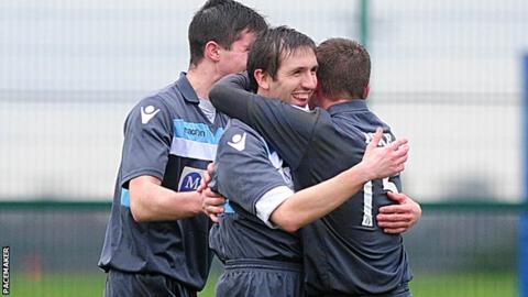 Action from the Irish Cup at Newforge