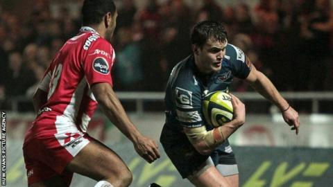 Scarlets’ Steffan Hughes runs in for his side’s first try