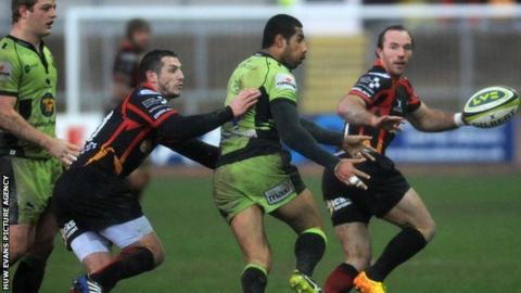 Jason Tovey in action for Dragons against Northampton
