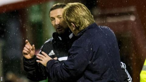 Derek McInnes and Stuart McCall exchange words during the 2-2 draw.