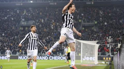 Juventus defender Stephan Lichtsteiner, of Switzerland, celebrates after scoring a goal during a Serie A match against Inter Milan