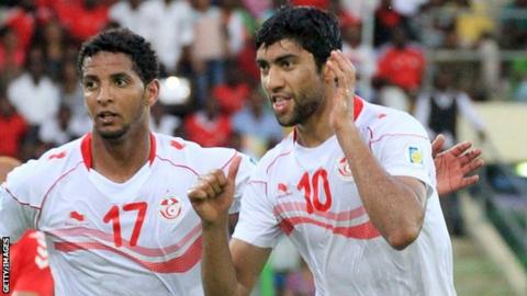 Tunisia's Issam Jomaa (left) and Oussama Darragi