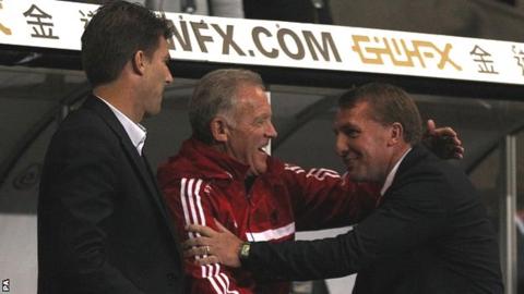 Brendan Rodgers (right) greets Michael Laudrup (left) and Alan Curtis on his return to Swansea