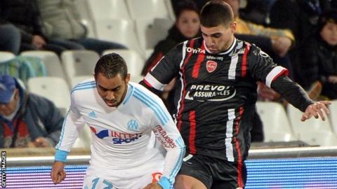 Carl Medjani (right) in action for Valenciennes