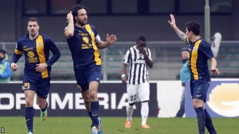 Luca Toni celebrates