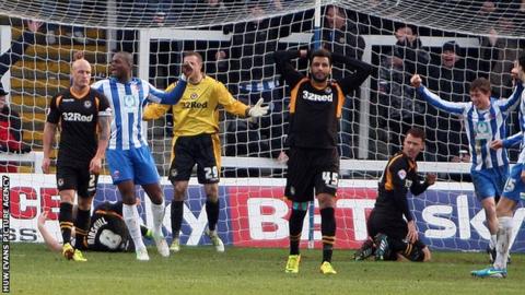 Newport players show their despair following Hartlepool's second goal