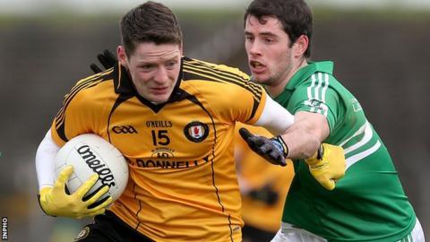 Ulster's Conor McManus is tackled by Donal Keegan