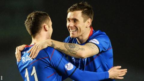 Greg Tansey (right) congratulates team-mate Nick Ross on his third minute goal