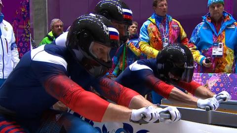 Russia have the lead after two heats of the four-man bobsleigh at the Winter Olympics.