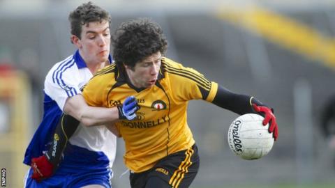 Sean Cavanagh battles with Connacht's Joss Moore at Tuam
