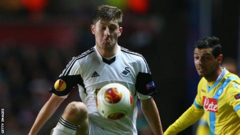 Swansea City's Ben Davies in action against Napoli