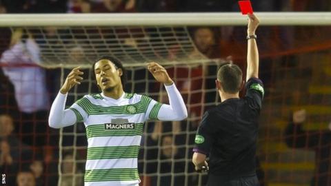 Virgil van Dijk is shown a red card by Craig Thomson