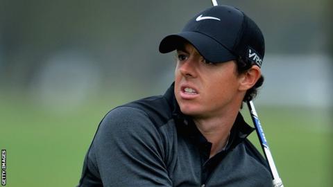 McIlroy watches his second shot on the 13th in Friday's round in Florida