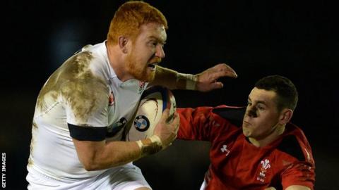 Joel Conlon goes past Wales Under 20's Tom Williams
