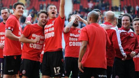 Sheffield United players celebrate reaching the FA Cup semi-finals