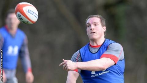 Gethin Jenkins throws a pass during a Wales training session