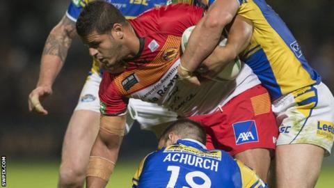 Jamal Fakir is halted by Mitch Achurch & Kevin Sinfield