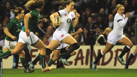 England's Emily Scarratt runs with the ball against Ireland