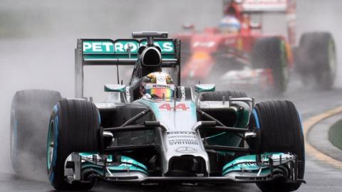 Mercedes driver Lewis Hamilton steals a last-ditch pole position in a thrilling wet qualifying session at the Australian Grand Prix.