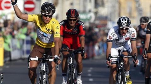 Carlos Betancur celebrates his overall win as he crosses the finish line