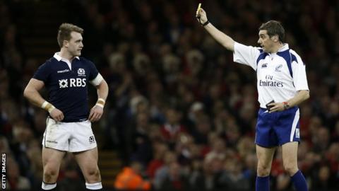 Stuart Hogg is shown the yellow card